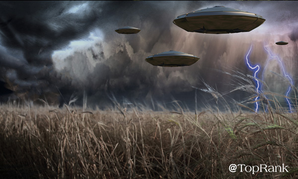UFOs over field of grass image.